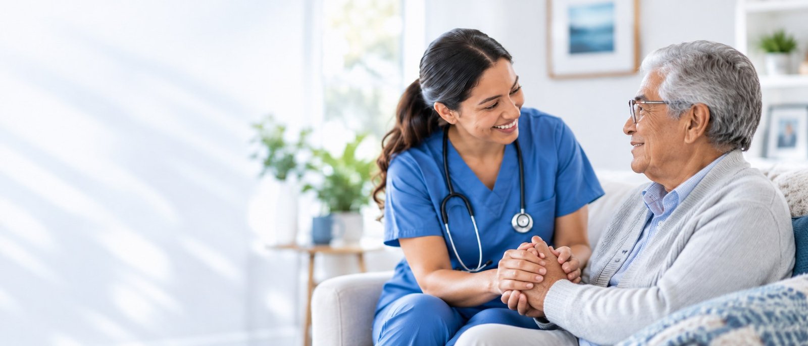 Healthcare professional offering compassionate support to an older adult in a comfortable home setting